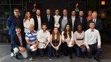 UEFA President Aleksander Čeferin (back row, fourth from left) met the young journalists and their mentors on the eve of the UEFA Women's EURO final
