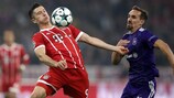 Bayern's Robert Lewandowski (left) and Sven Kums of Anderlecht on matchday one