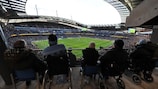Disabled spectators watch a match at the City of Manchester Stadium in England