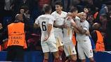 Edin Džeko is congratulated after scoring for Roma at Chelsea