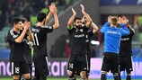 Qarabağ players celebrate earning a point against Atlético in their last home game