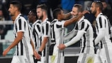 Douglas Costa celebrates after scoring the only goal for Juventus against Genoa