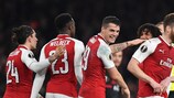 Granit Xhaka (centre) leads the Arsenal celebrations against Milan