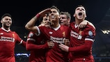 Roberto Firmino salutes a Liverpool goal in the quarter-finals