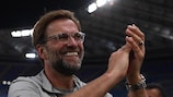 Jürgen Klopp applauding the crowd after Liverpool make it to the UEFA Champions League final