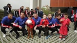 Albanian national team players at an Albanian Children's Foundation centre