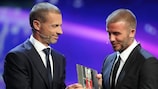 David Beckham (right) receives the UEFA President's Award from the UEFA President Aleksander Čeferin