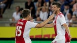 Klaas-Jan Huntelaar celebrates scoring one of his two goals against Sturm Graz