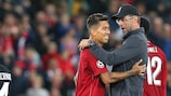 Match-winner Roberto Firmino (left) and manager Jürgen Klopp after Liverpool's opening victory