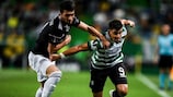 Qarabağ's Mahir Madatov (left) tries to escape Marcos Acuña of Sporting