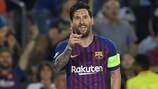 Lionel Messi celebrates his hat-trick goal in Barcelona's 4-0 win against PSV