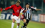 Manchester United's David Beckham (left) in action against Juventus defender Gianluca Zambrotta in 2003