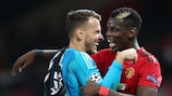 Valencia goalkeeper Neto (left) and Paul Pogba of Manchester United on matchday two