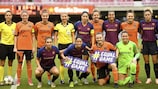 Barcelona and Glasgow City players together with match officials at their UEFA Women's Champions League game