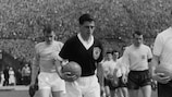 Eric Caldow leads the Scotland team out at the match against England at Wembley in 1961