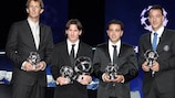 Edwin van der Sar, Lionel Messi, Xavi Hernández and John Terry pose with their UEFA Club Footballer of the Year titles in Monaco