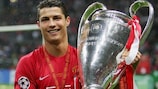 Cristiano Ronaldo proudly holds aloft the European Cup