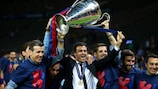 Luis Enrique (C) lifts the UEFA Champions League trophy on Saturday