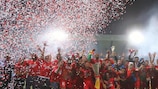 Sevilla celebrate with the trophy