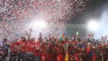 Sevilla celebrate with the trophy