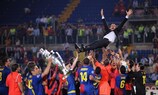 Josep Guardiola is thrown into the air by his Barcelona players