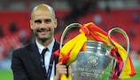 Josep Guardiola with the trophy he won with Barcelona in 2011
