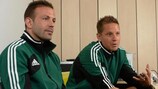 Referees Orel Grinfeeld and Martin Strömbergsson in conversation with UEFA.com