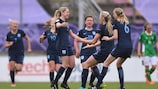 Poppy Pattinson (No3) is congratulated after putting England in front