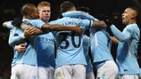 Manchester City celebrate Nicolás Otamendi's winning goal at Old Trafford