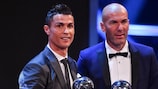 Cristiano Ronaldo and Zinédine Zidane with their trophies
