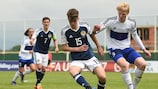 Scotland's Lewis Smith (left) is tracked by Faroe Islands defender Andrias Edmundsson