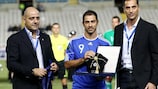 Yiannis Okkas receives his UEFA award for winning 100 caps