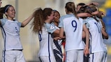 The England players celebrate their second goal, scored by Alessia Russo