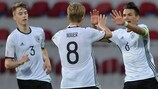 Germany captain Atakan Akkaynak celebrates with Arne Maier, who set up his goal
