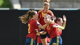 Lucía García (No17) is mobbed after netting the first of her three goals