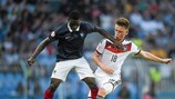 Germany defender Jonas Busam challenges France's Jean-Victor Makengo