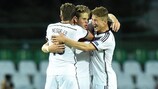 Daniel Nesseler, Joel Abu Hanna y Salih Özcan celebran la victoria de Alemania