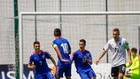 Croatia's Davor Lovren (C) wheels away in celebration