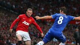 United's Wayne Rooney takes on Frank Lampard