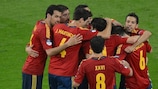 Fernando Torres is mobbed by his Spain team-mates after scoring his second goal of the night