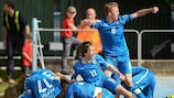 Slovakia celebrate their late goal in the victory against Austria