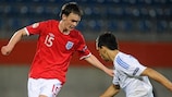 Joshua McEachran (left) takes on Konstantinos Rougkalas in England's win against Greece