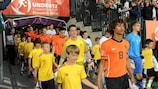 Netherlands captain Nathan Ake leads out his team against Slovenia.