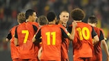 Belgium celebrate after Timmy Simons (centre) converts a penalty against Azerbaijan