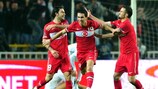 Arda Turan (centre) celebrates his goal