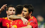 Ianis Zicu is embraced by fellow scorer Adrian Mutu (right) after netting against Luxembourg