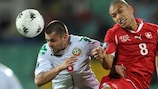 Switzerland's Gökhan Inler (right) and Spas Delev jostle for possession