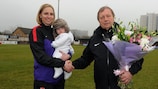 Faye White receives a presentation from general manager Vic Akers