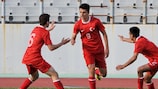 Enes Ünal (centre) scored four goals for Turkey