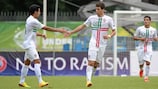 Portugal's Alexandre Guedes (right) is congratulated after scoring one of his three goals